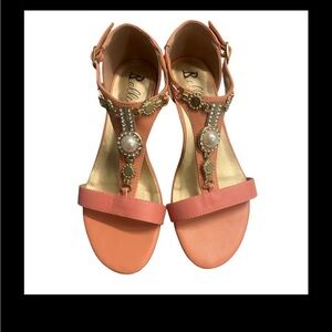 Bellimi Peach wedge-heeled T-strap sandals buckle closure and a charmed t-strap.